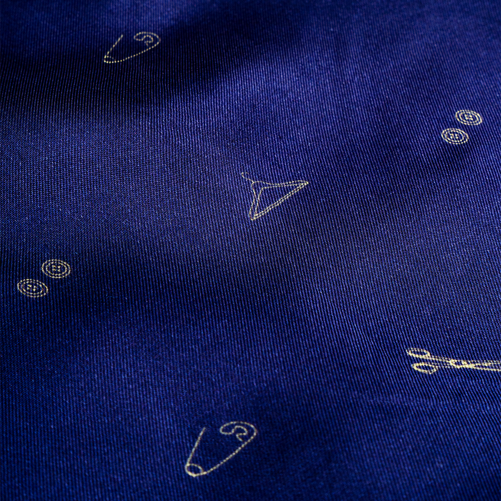 Close-up of a vest lining with white geometric patterns