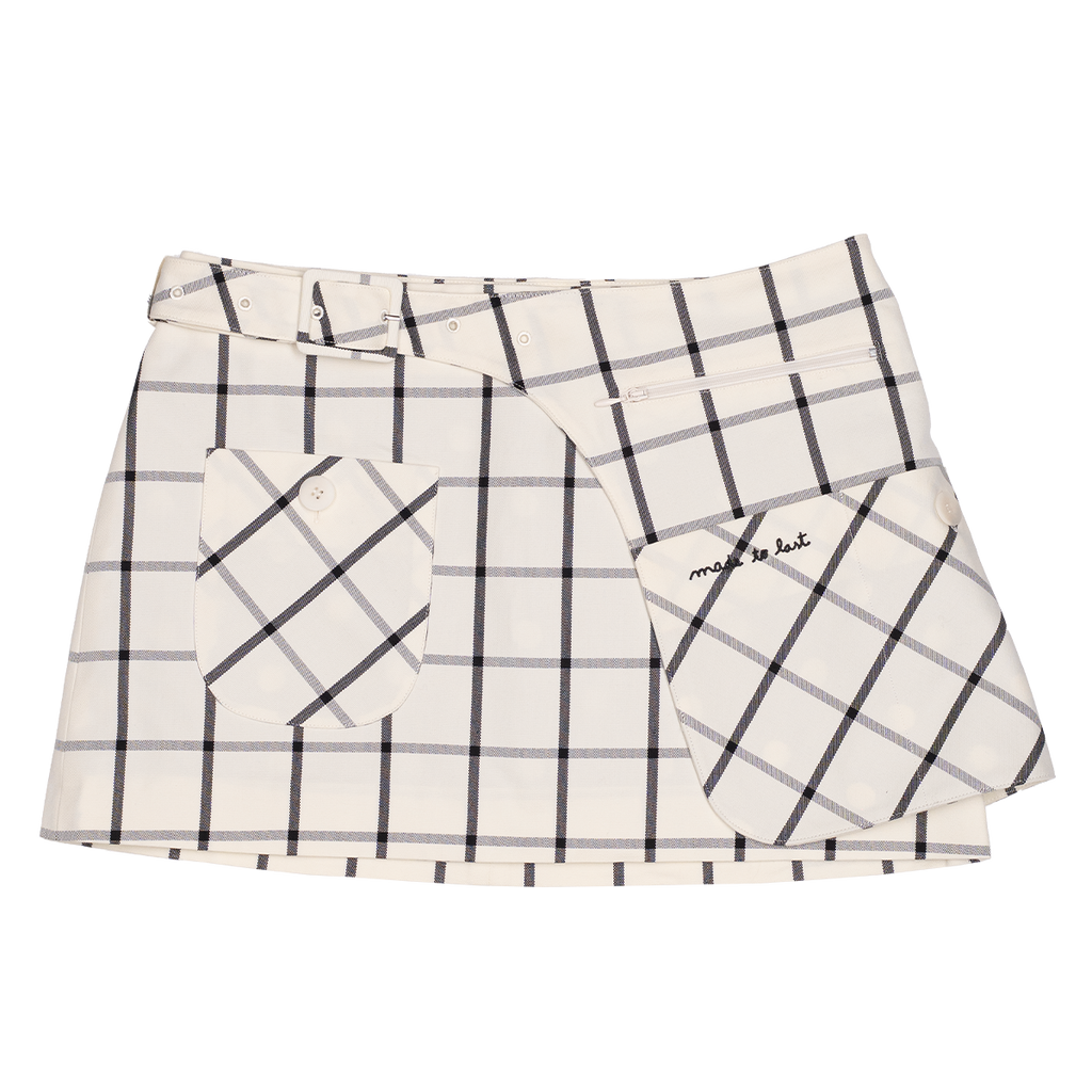 Plaid patterned skirt with a white background