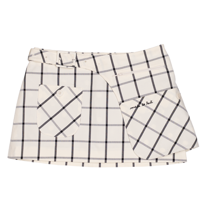 Plaid patterned skirt with a white background