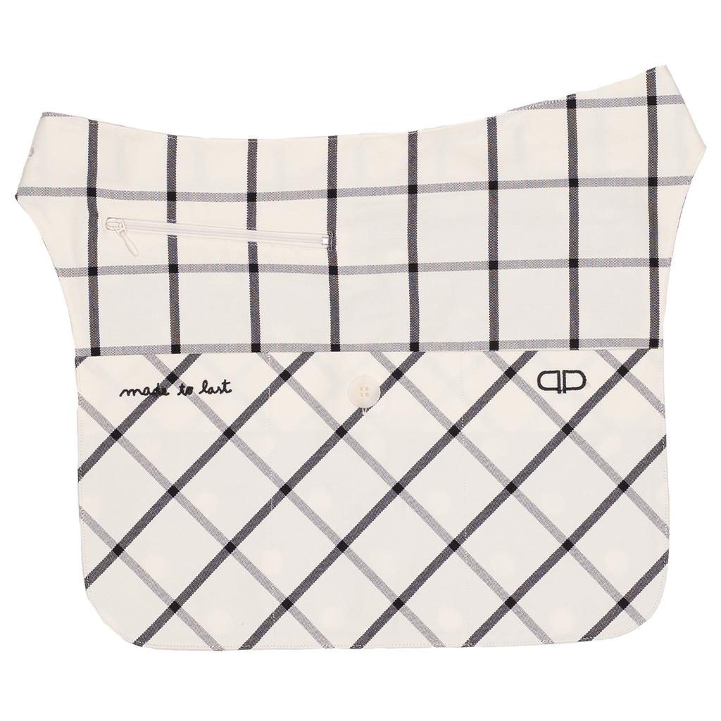 Plaid-patterned bag with 'made to last' branding on a white background