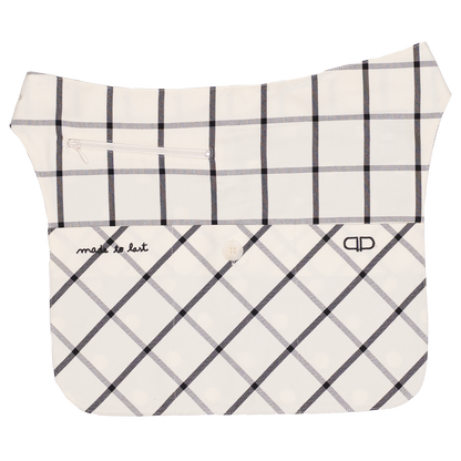 Plaid-patterned bag with 'made to last' branding on a white background