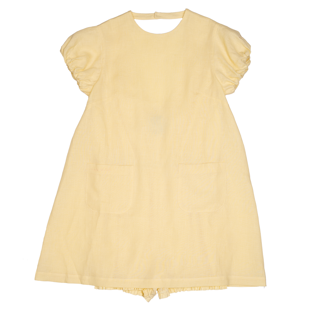 Yellow dress with ruffled sleeves on a white background