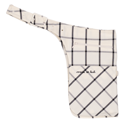 Plaid-patterned bag with 'made to last' text on a white background