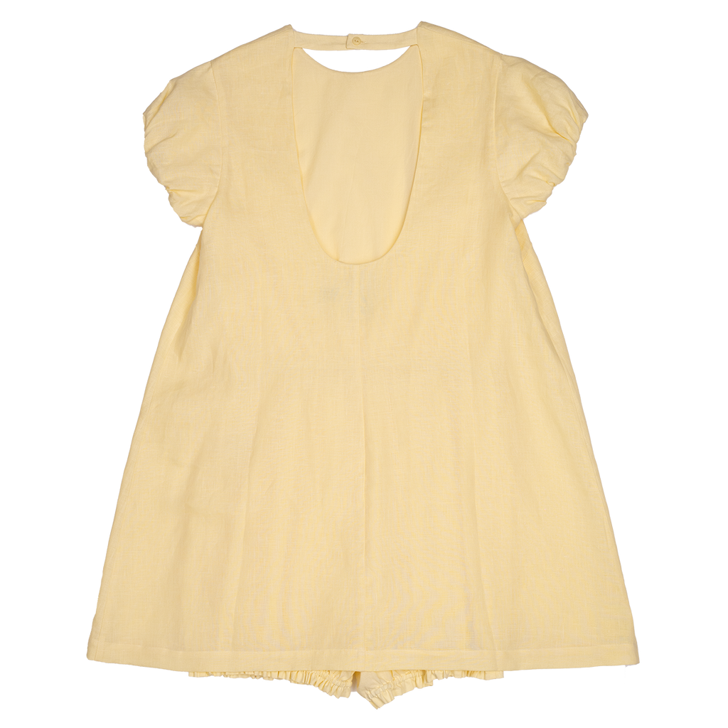 Yellow dress with ruffled sleeves on a white background
