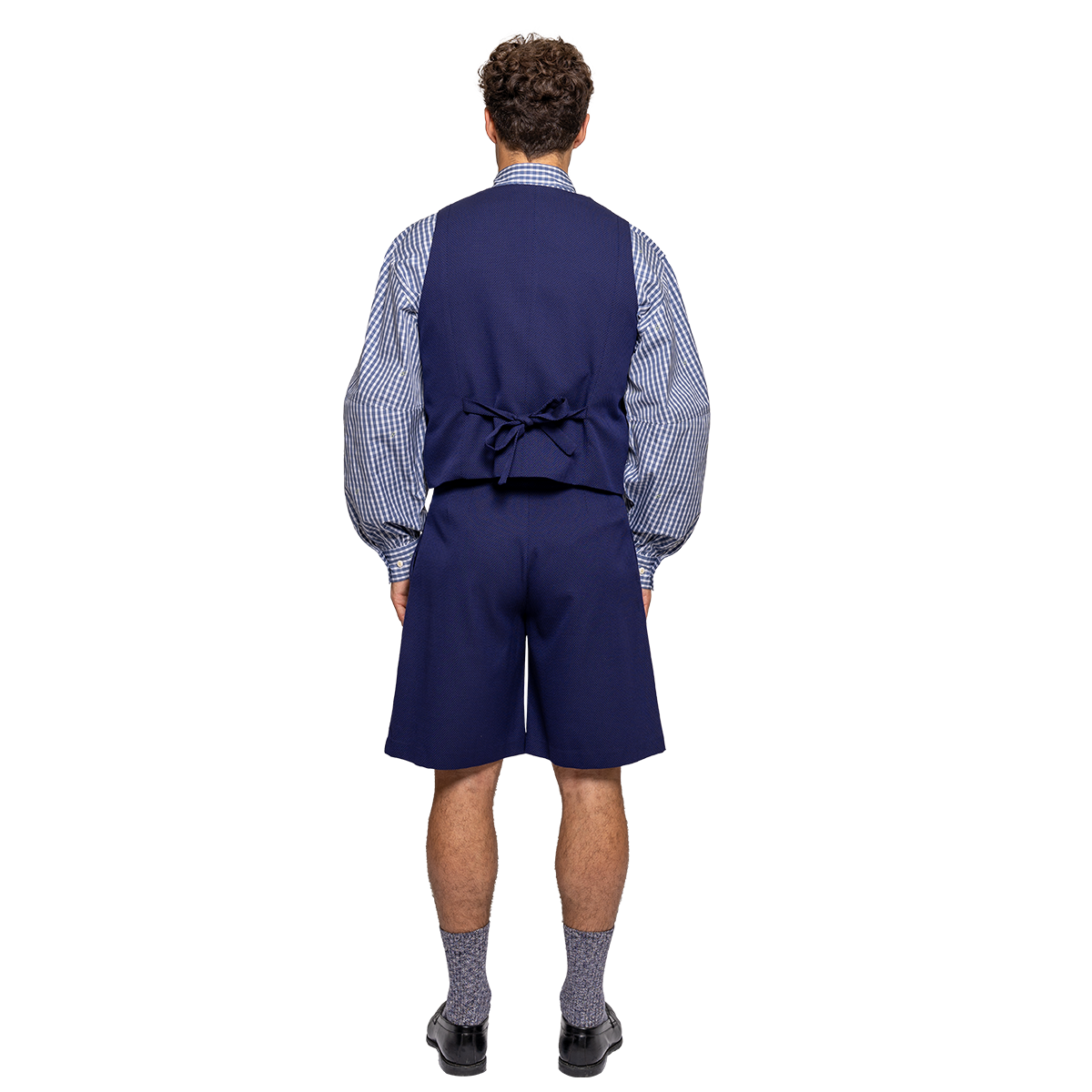 Person wearing a blue vest, checkered shirt, and shorts on a white background