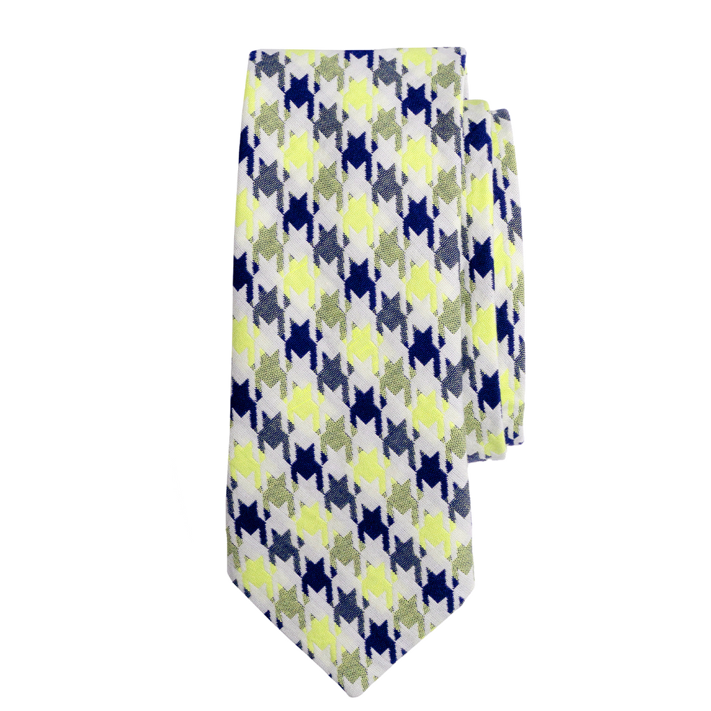 Patterned tie with blue, green, and yellow design on a white background