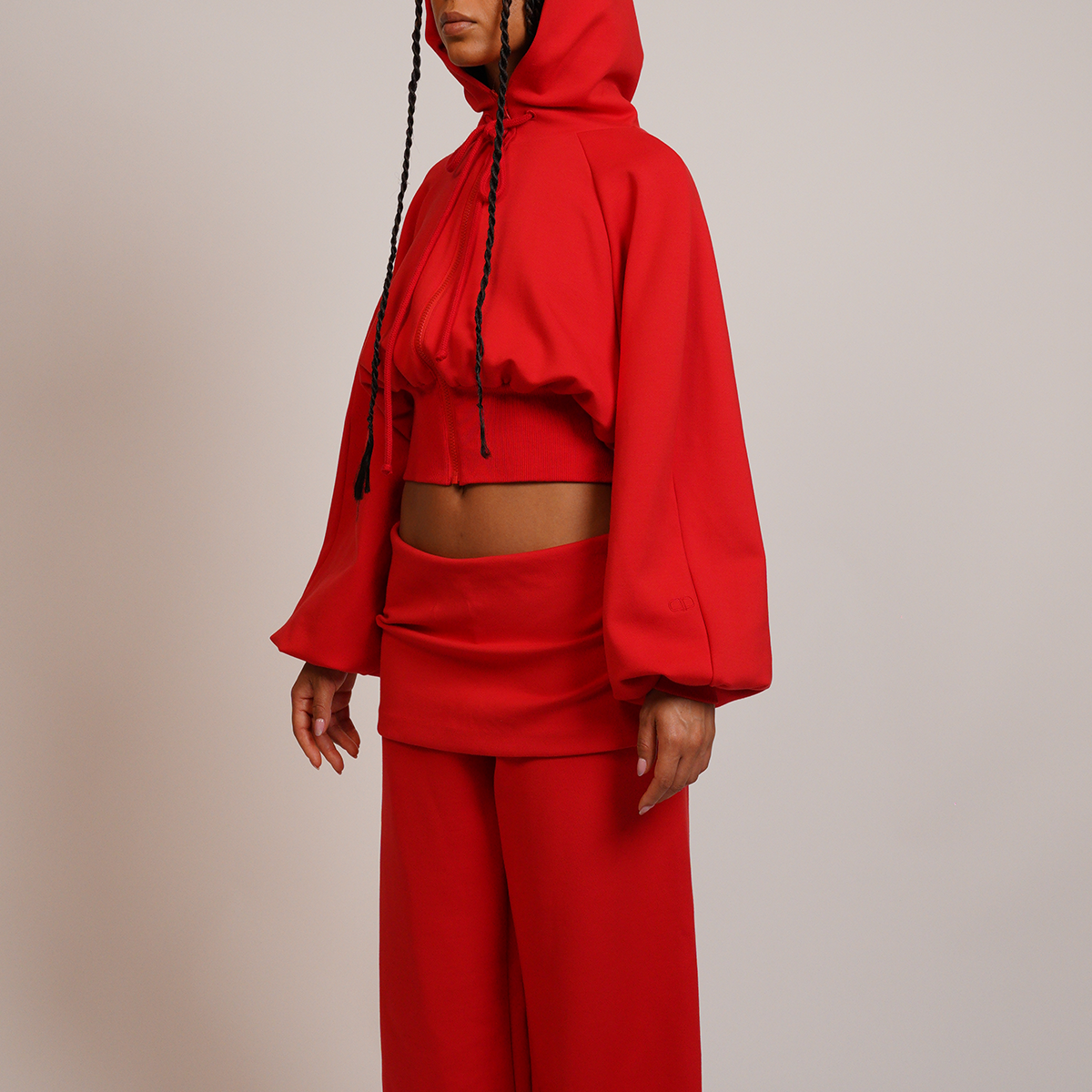 Person wearing a red hoodie 
