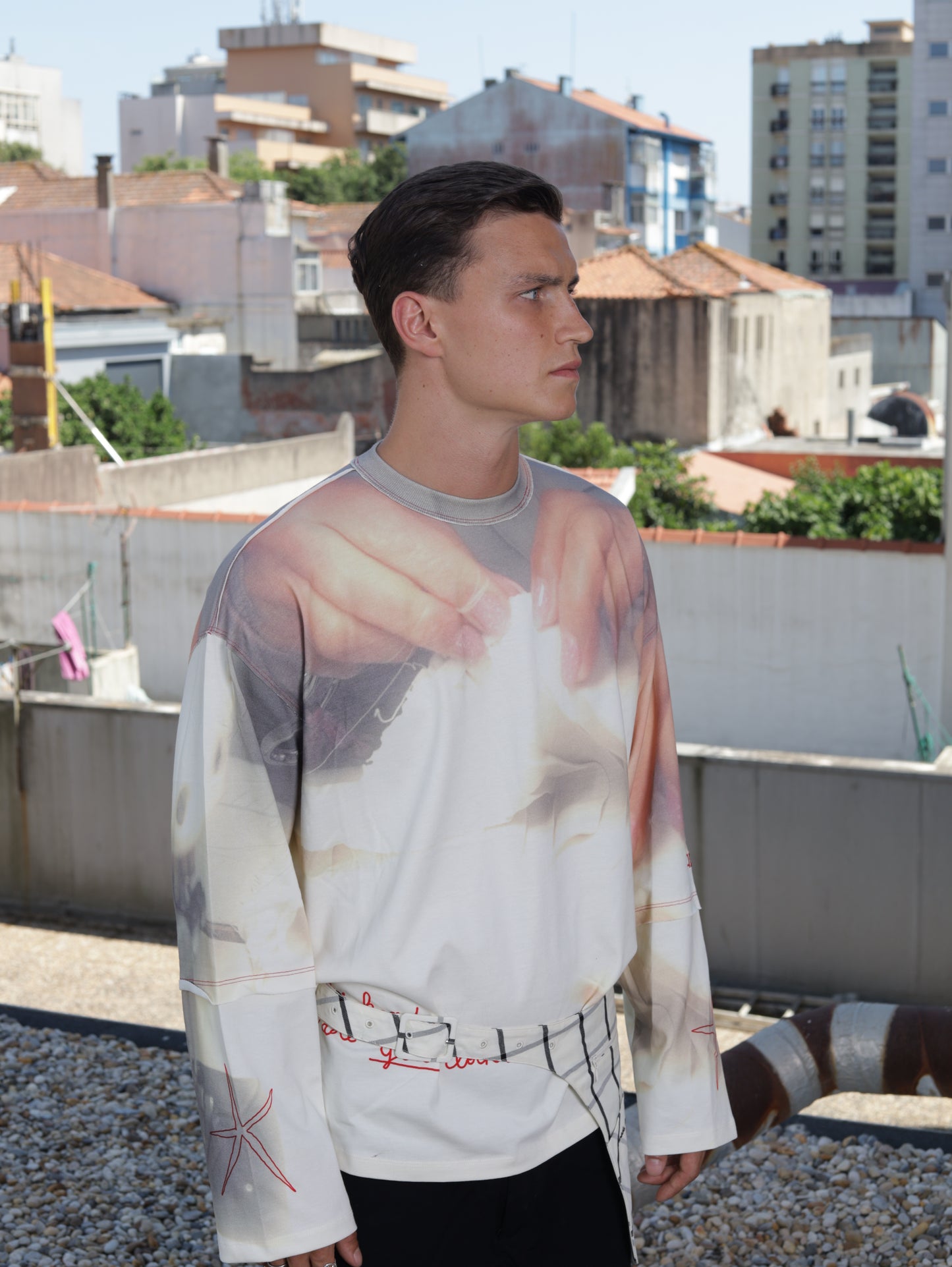 Person wearing a shirt with a graphic design 