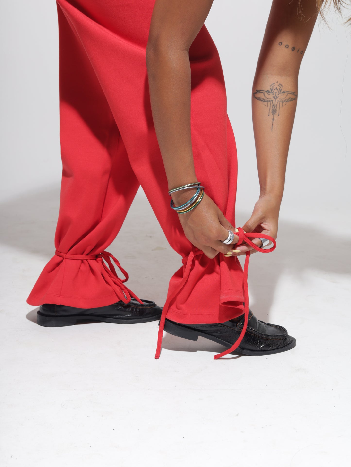 Person wearing red pants 